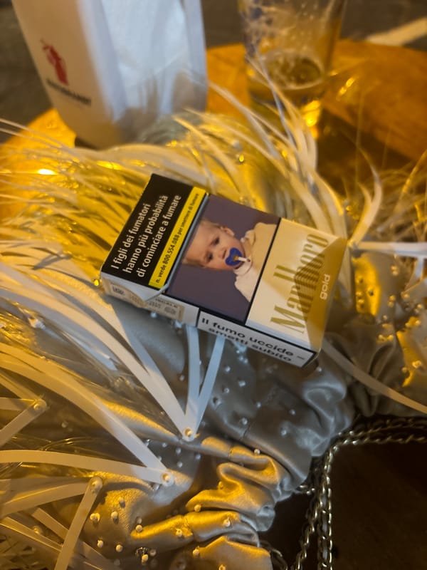 Cigarettes and Dog Captured in Street Scenes in Lipari