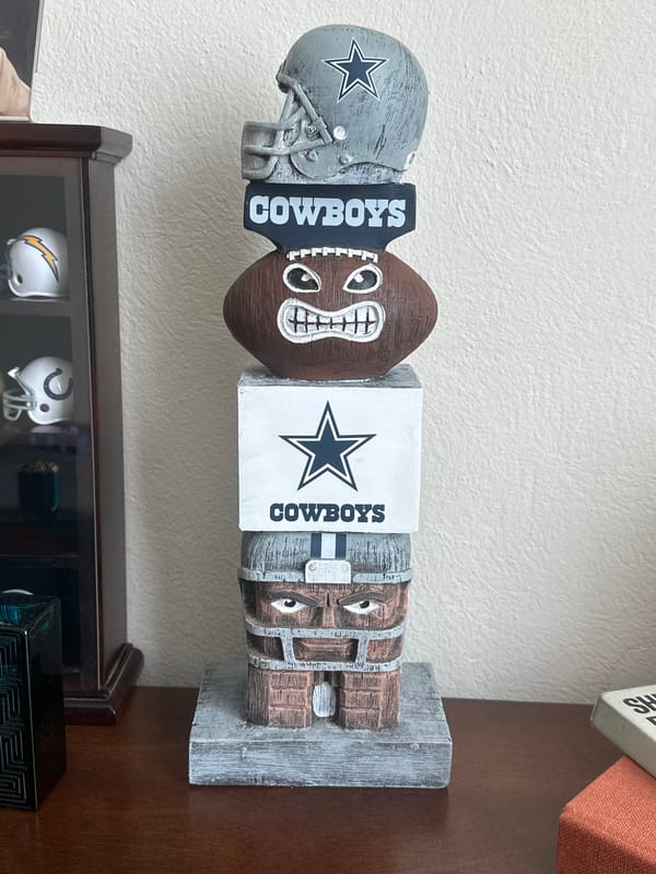 Cowboys totem pole spotted on shelf in Mexico