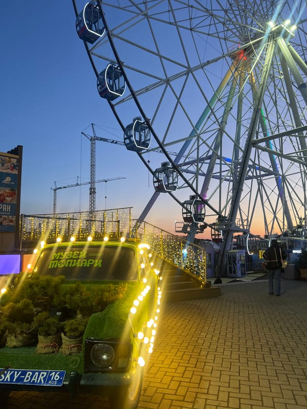 Ferris wheel captured at dusk in Kazan, Russia
