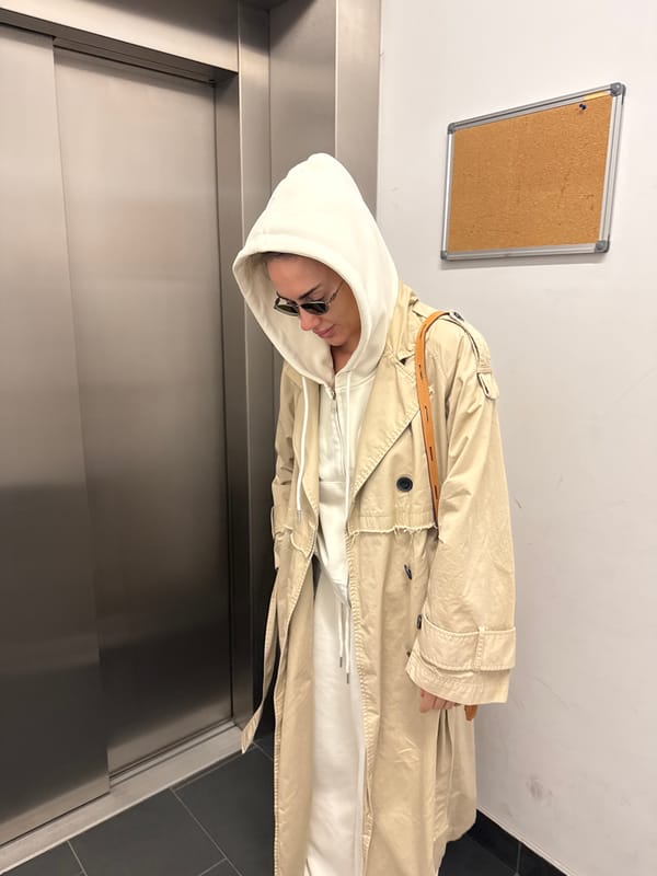 Person in trench coat spotted at Warsaw building locations
