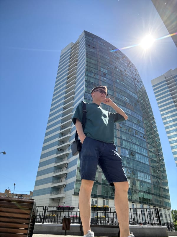 Young man poses at Moscow residential complex