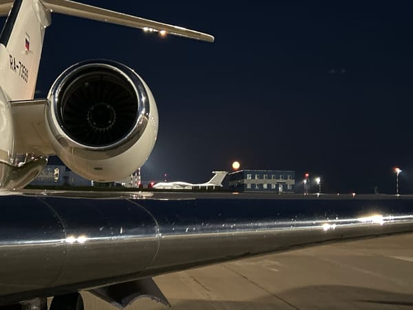 Corporate jet on the tarmac at Minsk Airport, late night