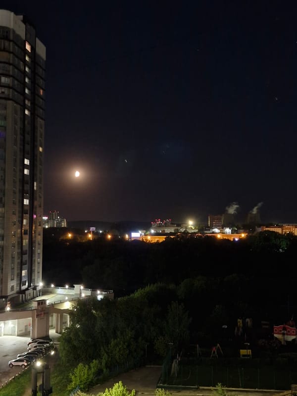 Nighttime urban views documented in Yekaterinburg under moonlight