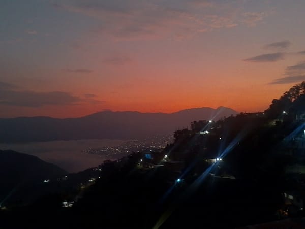 Dawn captured over mountainous Caracas cityscape in Venezuela