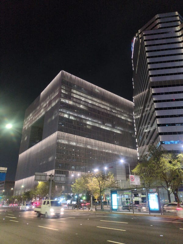 Nighttime Seoul scenes captured: highway traffic, Trump World building, subway