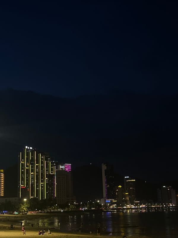 Nha Trang nighttime coastline with a telescope in the mix