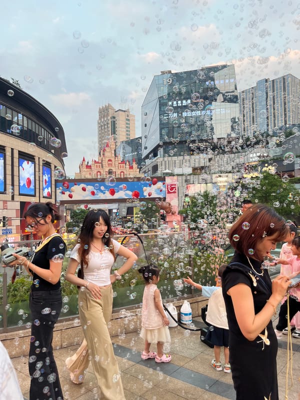 Soap Bubbles Fill Busy Pedestrian Areas in Yuzhong District