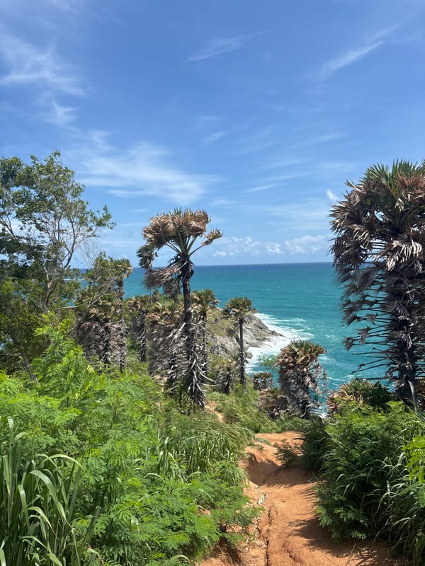 Cliffside coastal views along the rocky shoreline of Rawai