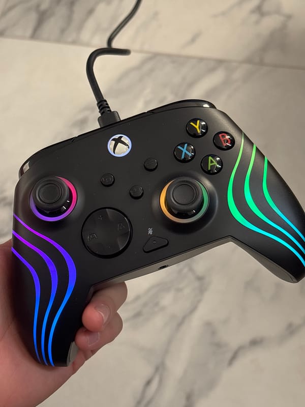 Xbox controller with LED lights held in Mexico