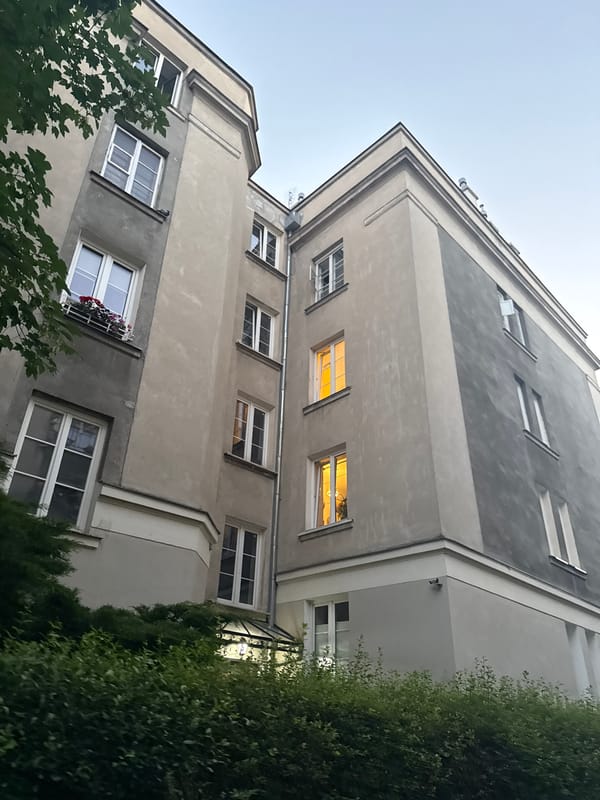 Evening dog walk through a Warsaw residential neighborhood