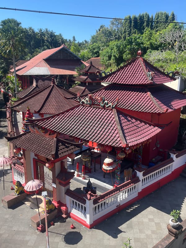 Red-walled Balinese temple complex in Blahbatuh, sunny morning