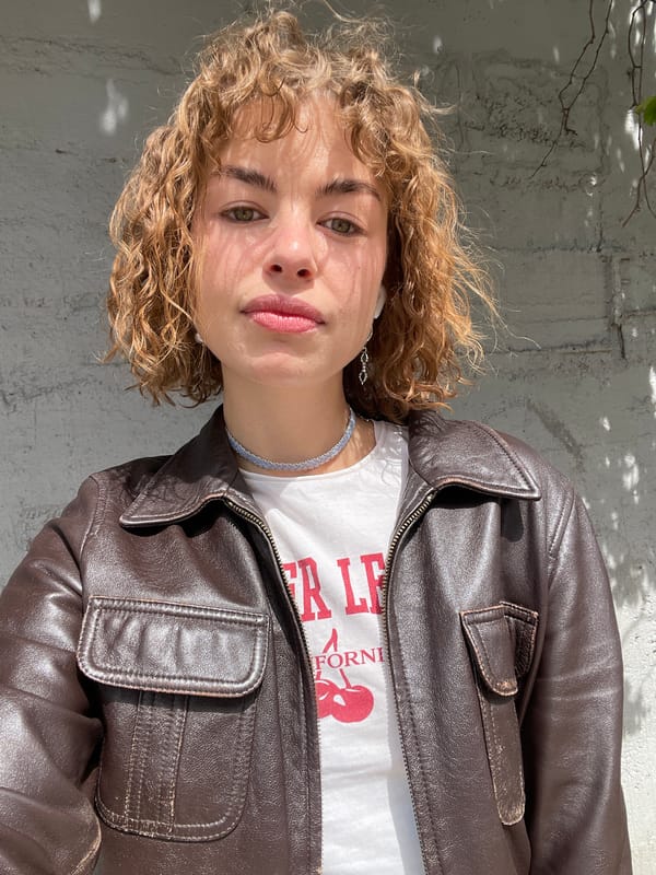 Woman in leather jacket photographed multiple times in Montenegro