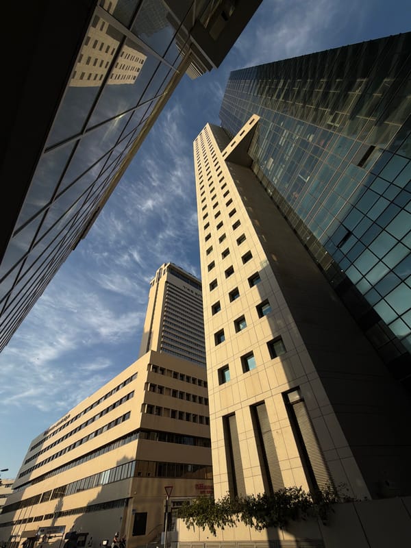 Tel Aviv afternoon: architecture, dining, and personal documentation captured