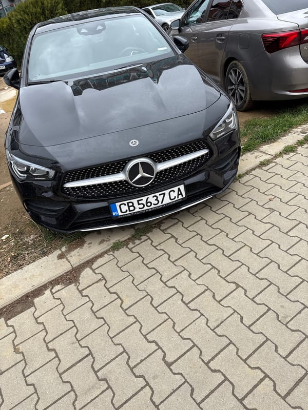 Man Takes Selfies on Sofia Street During Overcast Morning