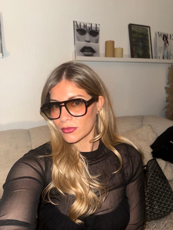 Women document Paris evening with Eiffel Tower views