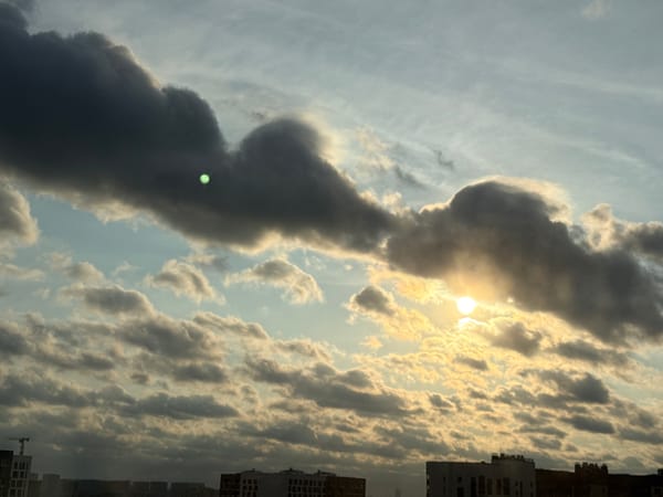 Cloudy afternoon sky over Lyubertsy's residential high-rises