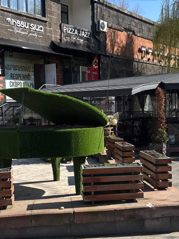 Two people spotted outside Pizza Jazz cafe in Gyumri
