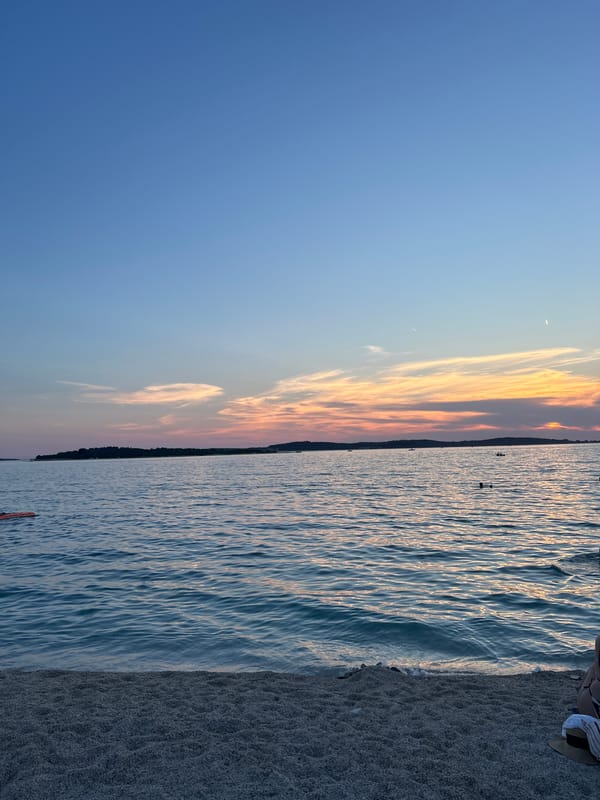 Golden hour at the beach, people winding down at dusk