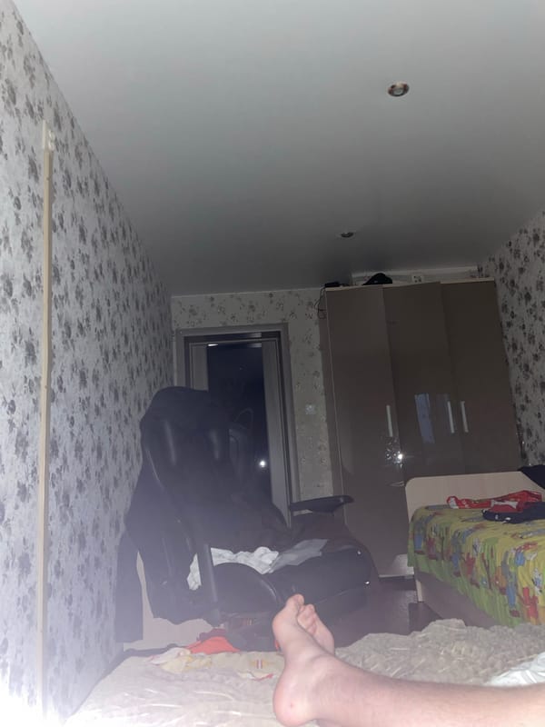 Casual bedroom hangout captured in Semyonov, Russia