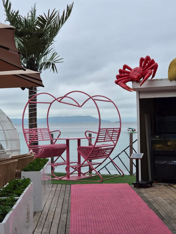 Vladivostok waterfront: cafes, harbor, streets, and sea on a cloudy day