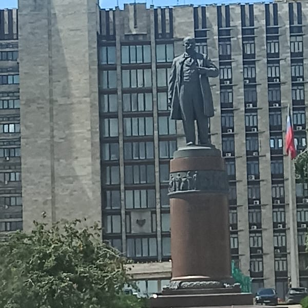 Street scenes and Soviet-era landmarks in an Eastern European city