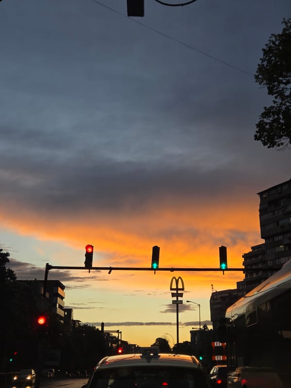 Dramatic sunset creates striking sky contrast over Varna streets