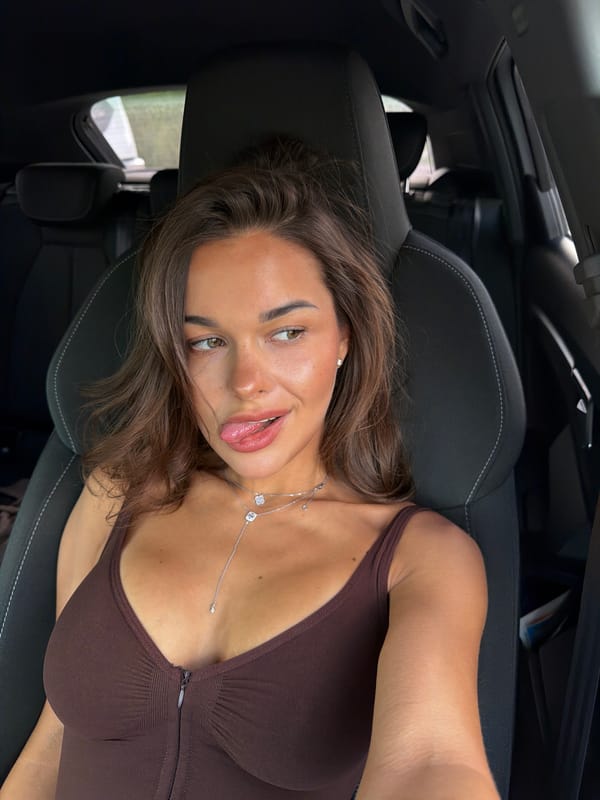 Woman takes playful car selfies in Krasnoyarsk