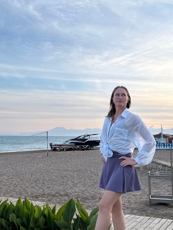 Woman photographed at sunset beach resort in Serik, Turkey