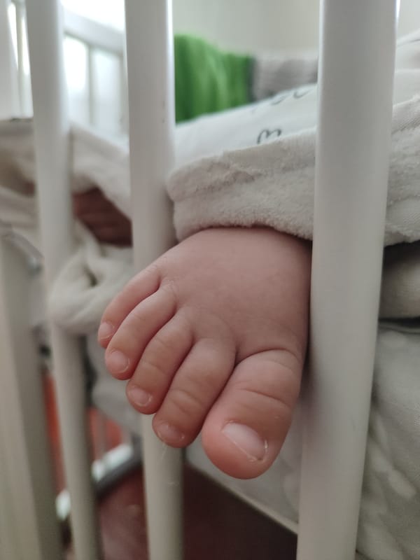 Baby gear and wireless earbuds at home