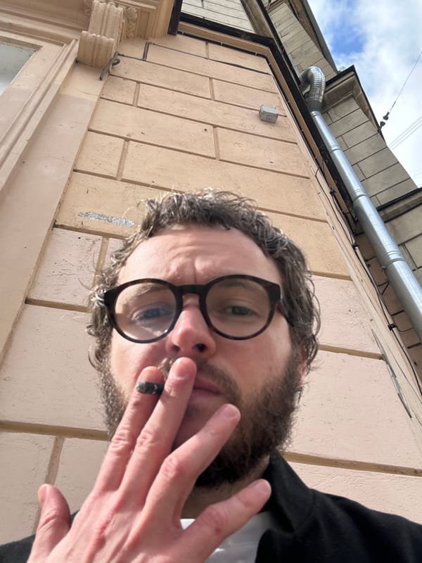 Morning coffee and selfie captured in sunny Saint Petersburg