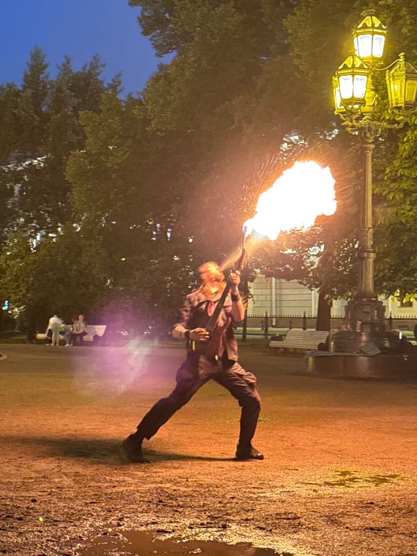 Fire performers showcase flame arts in Saint Petersburg's Palace Square