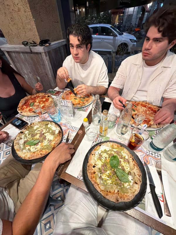 Pizza night in Milan with mochi and handheld games on the side