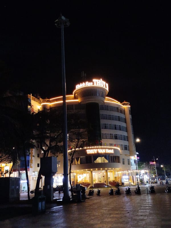 Nighttime whale statue and hotel captured in Vietnam