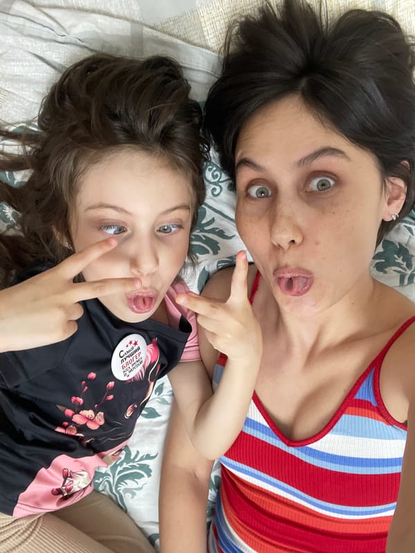 Woman takes selfies with girl in Izhevsk apartment