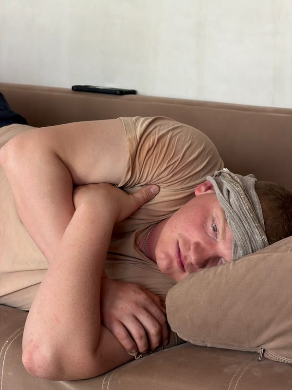 Person resting on sofa observed in Chaikovsky, Russia