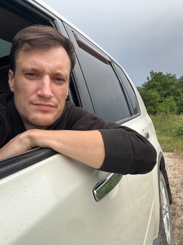 Roadside stop near wind turbine and comms tower, Korchivka