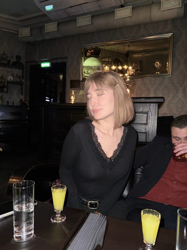 Late night social gathering captured at Moscow bar