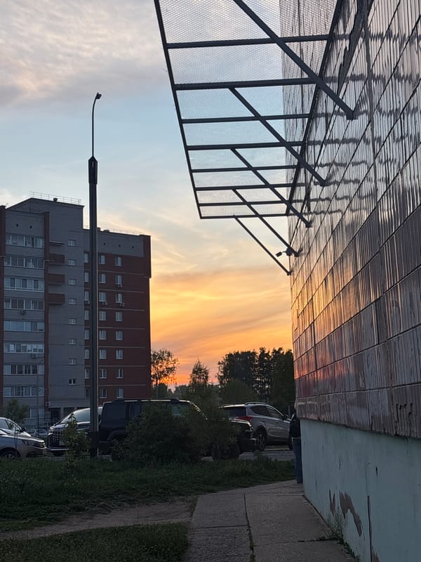 Urban street scene with buildings documented by witness