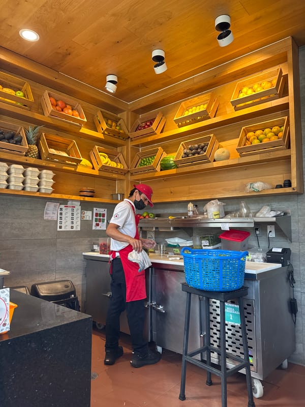 Food worker photographed at Mexico City bakery counter