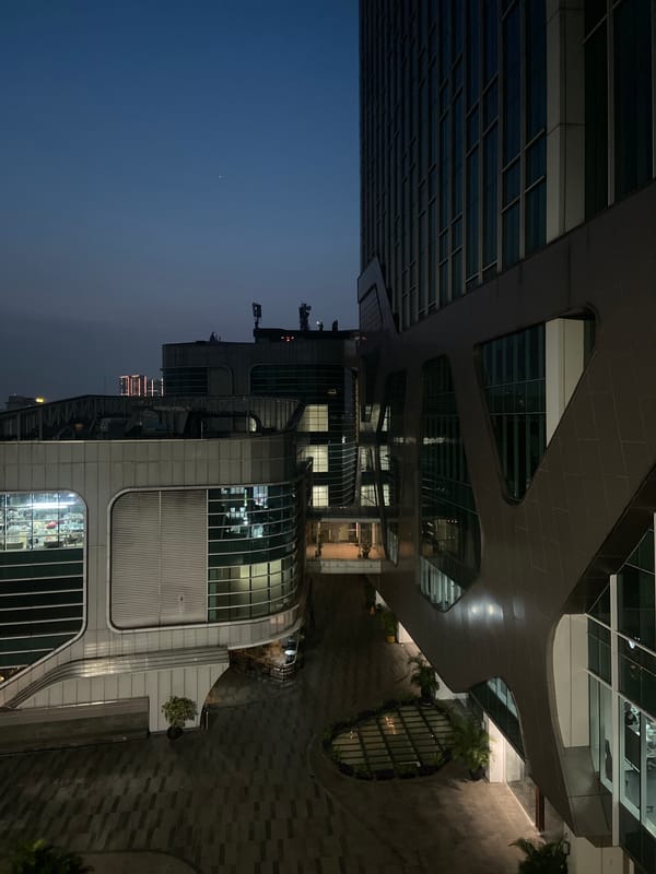 Modern Jakarta building complex observed at night
