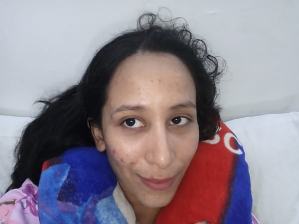 Woman resting in bed observed in Porlamar, Venezuela
