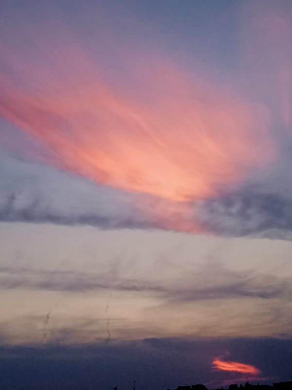Sunset to twilight sky series with moon rise over city