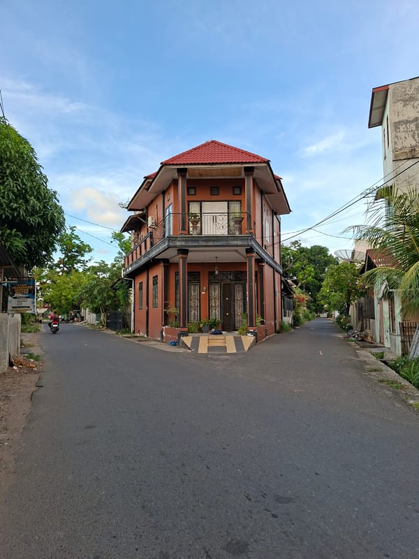 Colonial building documented at Lhokseumawe street intersection