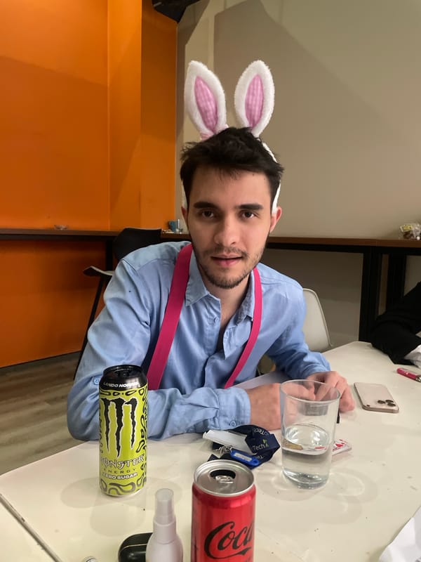 Man in bunny ears and pink suspenders photographed in Sofia