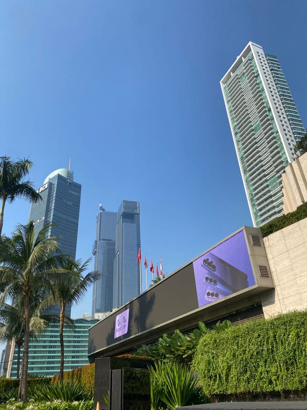 Urban landscape documented in Central Jakarta with skyscrapers, palms