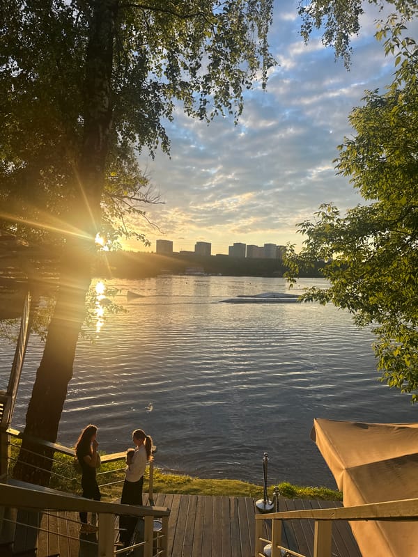 Sunset evening at a Moscow lakeside café and waterfront