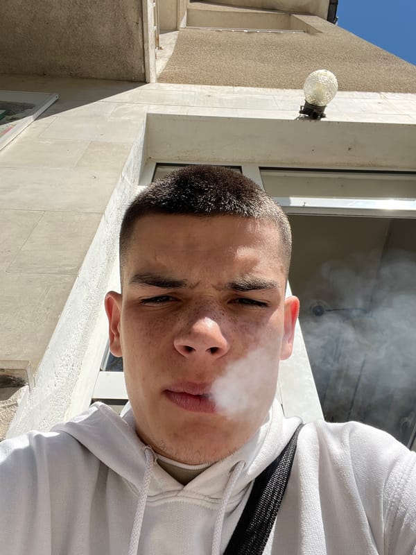 Young man smoking captured on Karlovo street