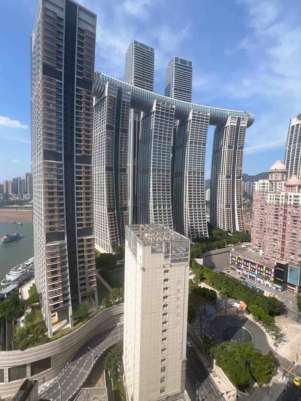 Chongqing's riverfront skyline and landmark architecture from above