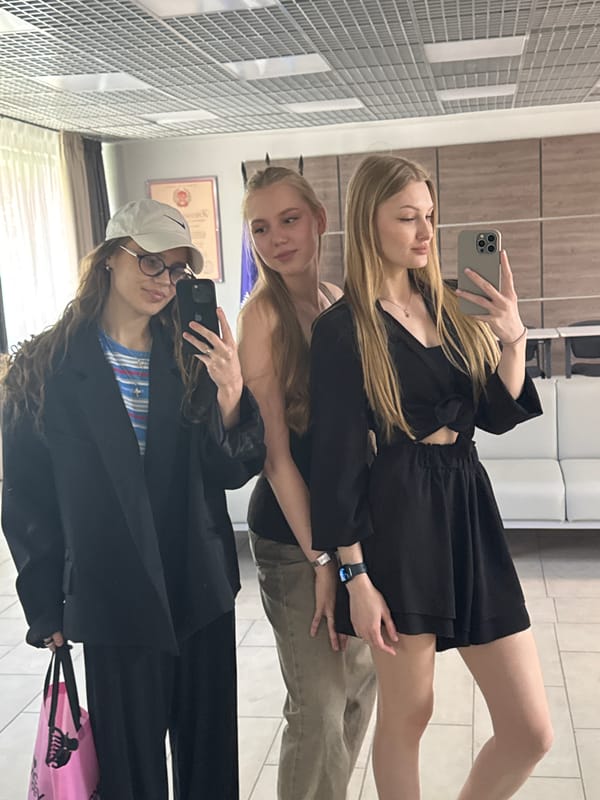 Three women photographed taking selfies in Perm public space