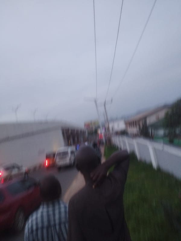 Evening street activity along a Jos road, Nigeria